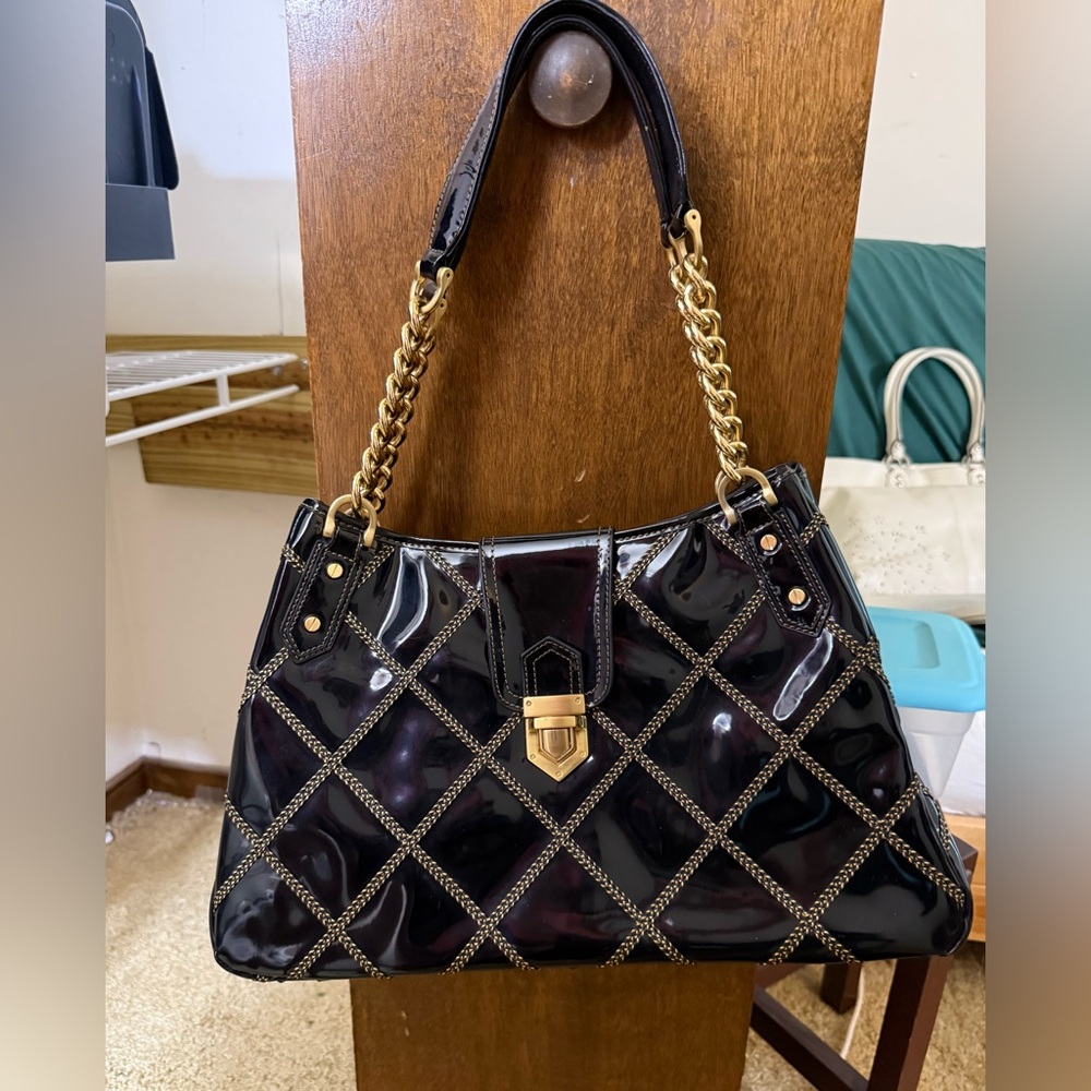 Eric Javits patent black quilted handbag